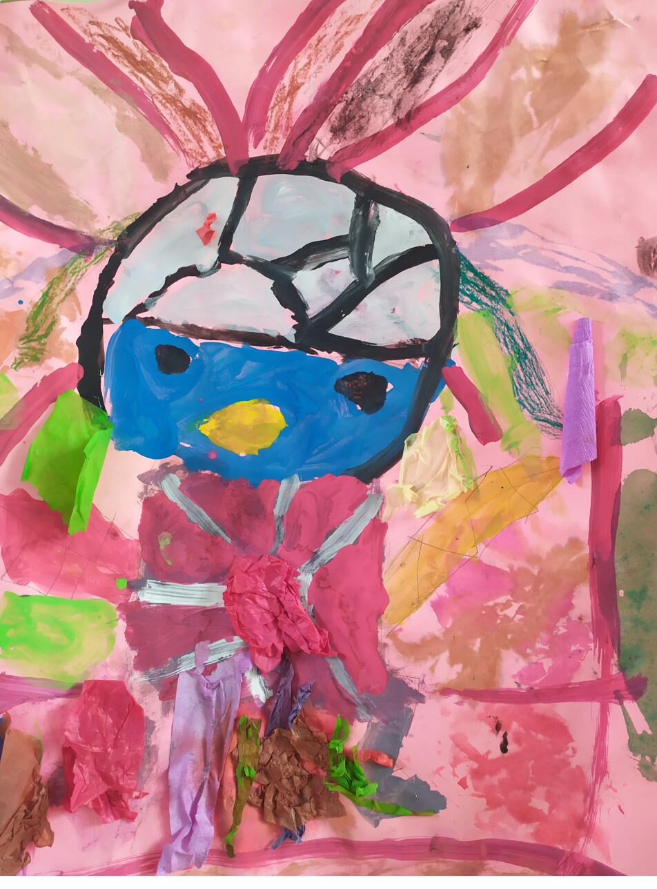 Œuvre collective réalisée en atelier d'arts plastiques : visage peint et collages